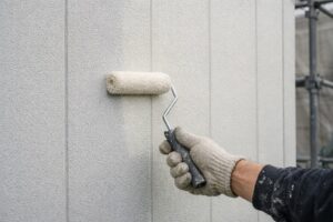 練馬区 外壁塗装 ALC外壁 下塗り シーラー ローラー塗布 縦目地 パネル外壁 施工中