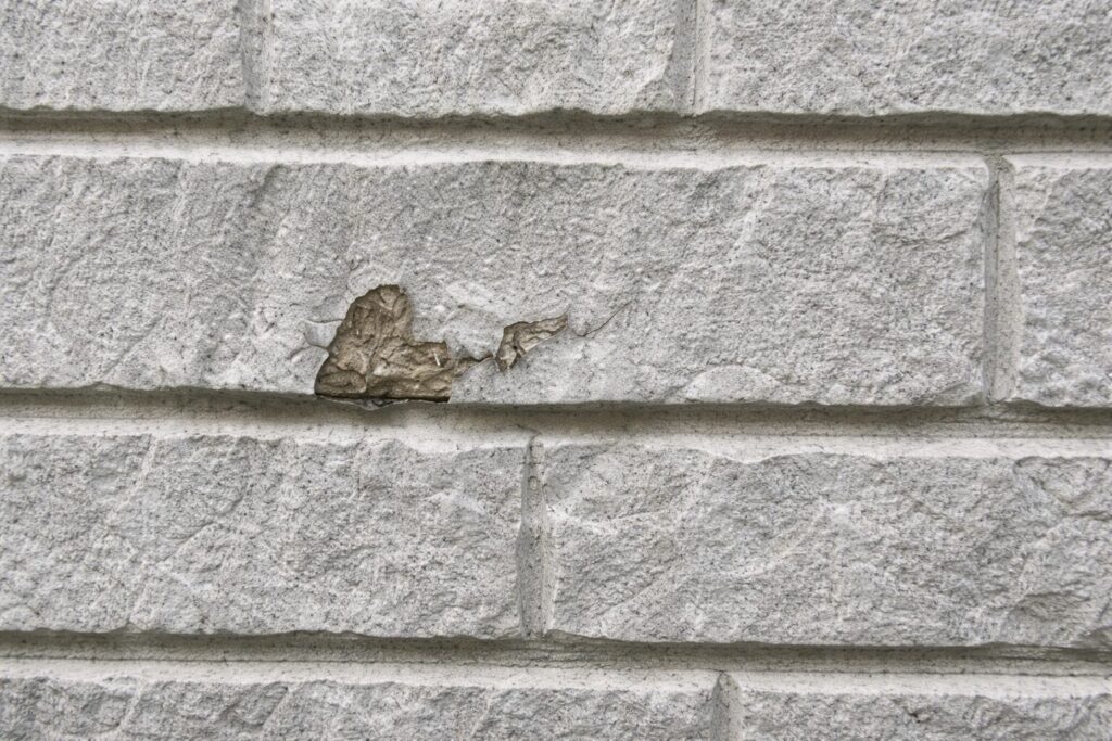 板橋区 外壁塗装 窯業系サイディング 表面剥がれ 下地露出の状態